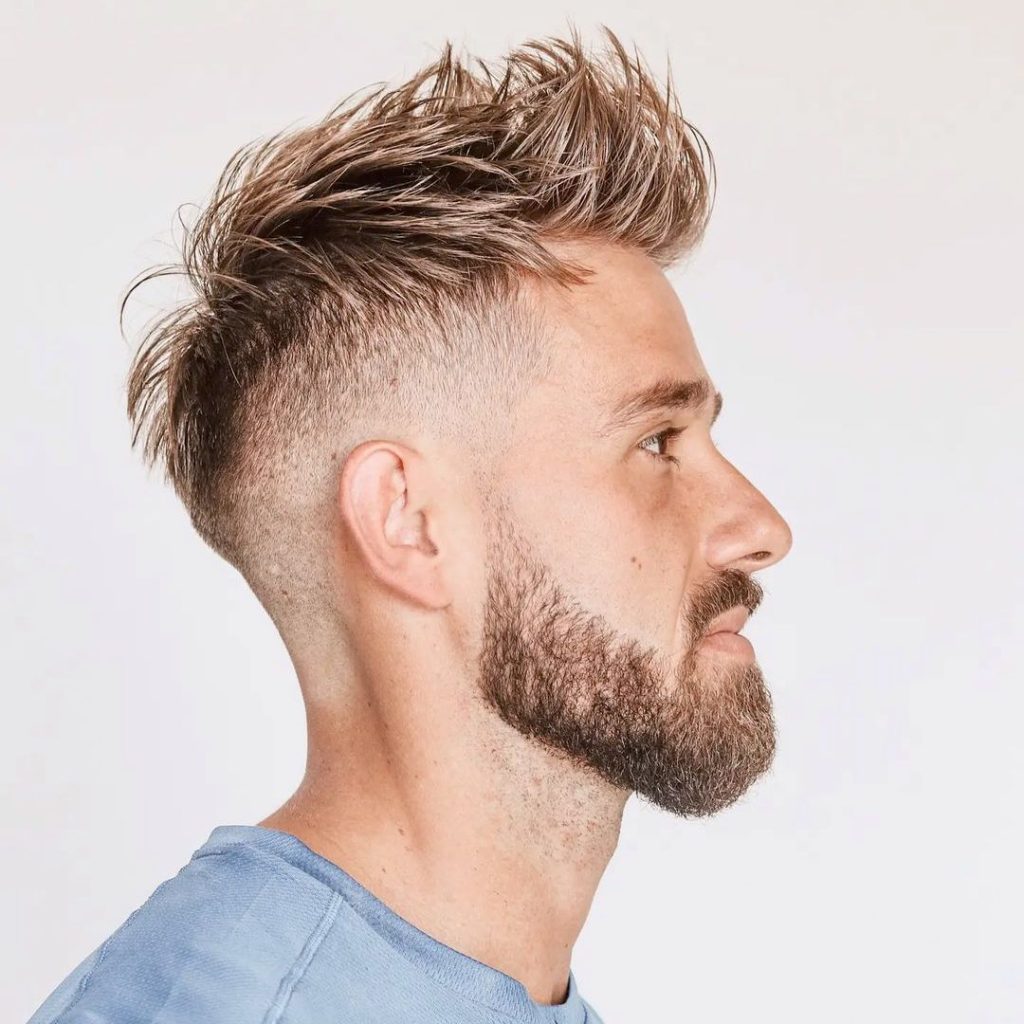 Messy faux hawk hairstyle with beard