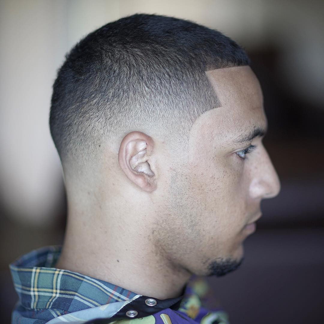Drop fade haircut for men with goatee