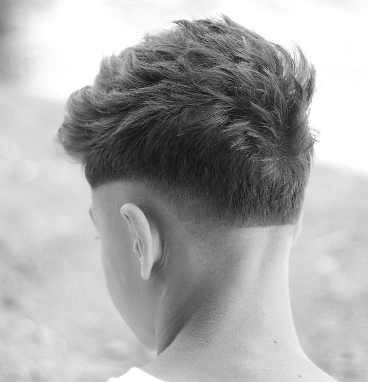 Cool short haircut for men with short textures and a low fade